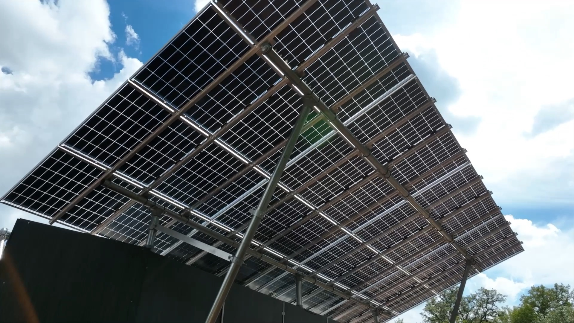 Looking up through the REV bifacial solar canopy at the sky
